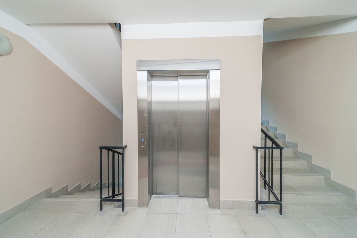 Elevator and stairs up and down in a modern elegant building